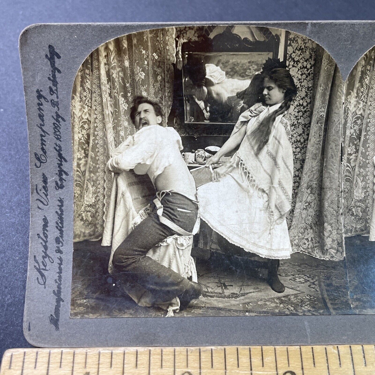 Antique 1899 Woman Waxes Man's Back Scream In Pain Stereoview Photo Card P2832