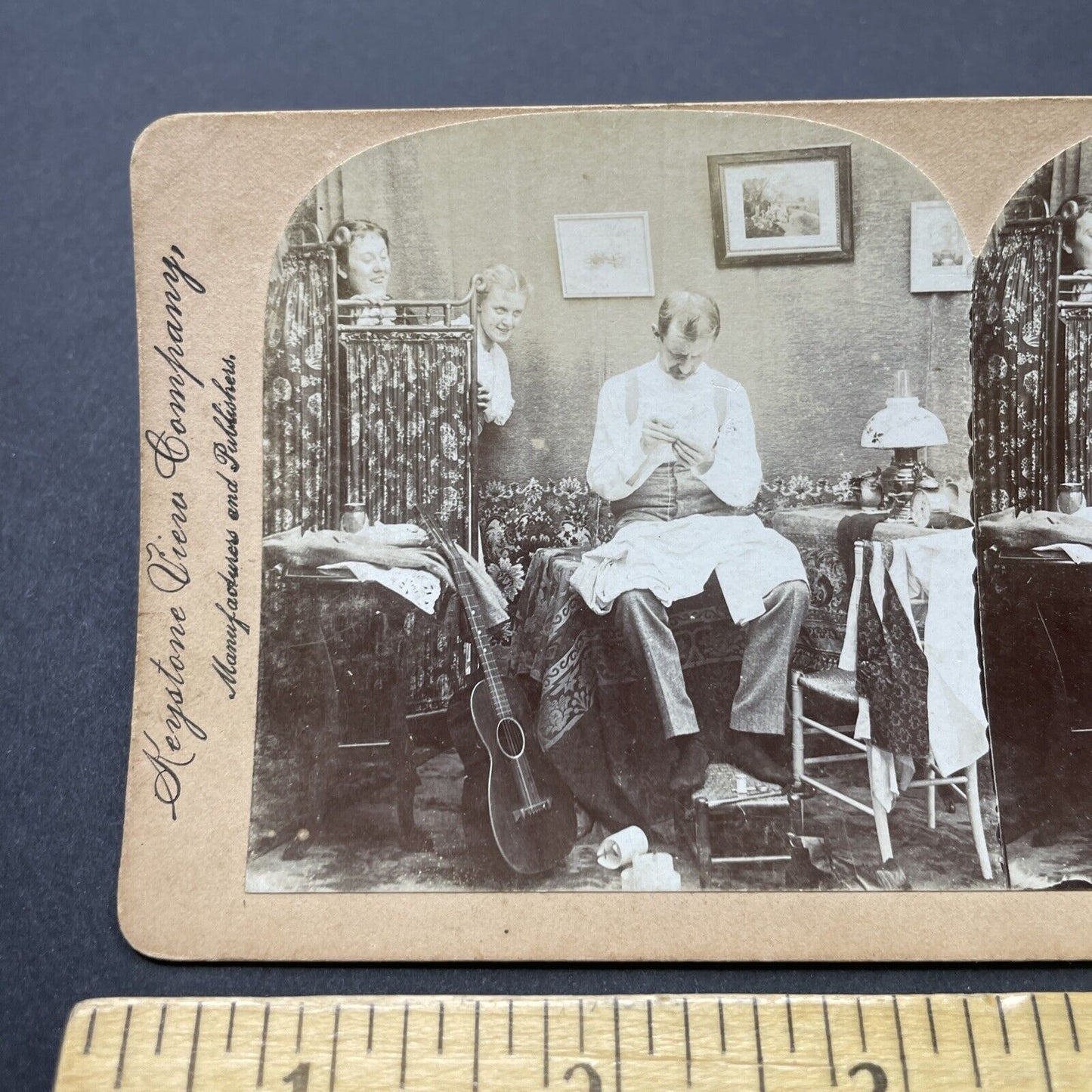 Antique 1896 Women Smile As A Man Sews His Shirt Stereoview Photo Card P2556