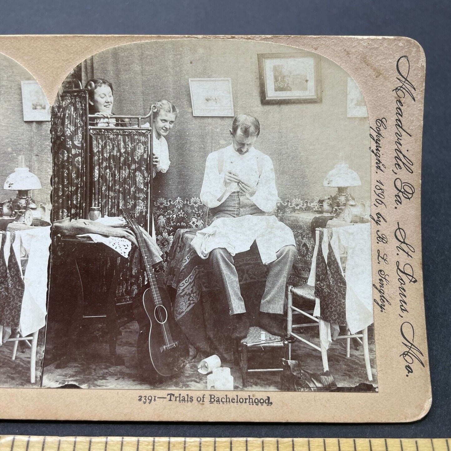 Antique 1896 Women Smile As A Man Sews His Shirt Stereoview Photo Card P2556