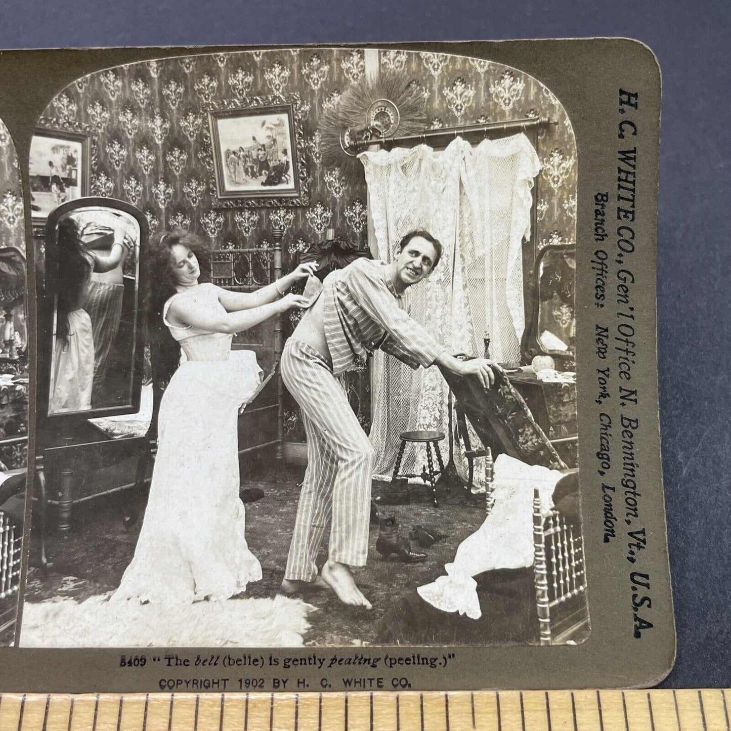 Antique 1902 Woman Waxes Man's Back Stereoview Photo Card P2698