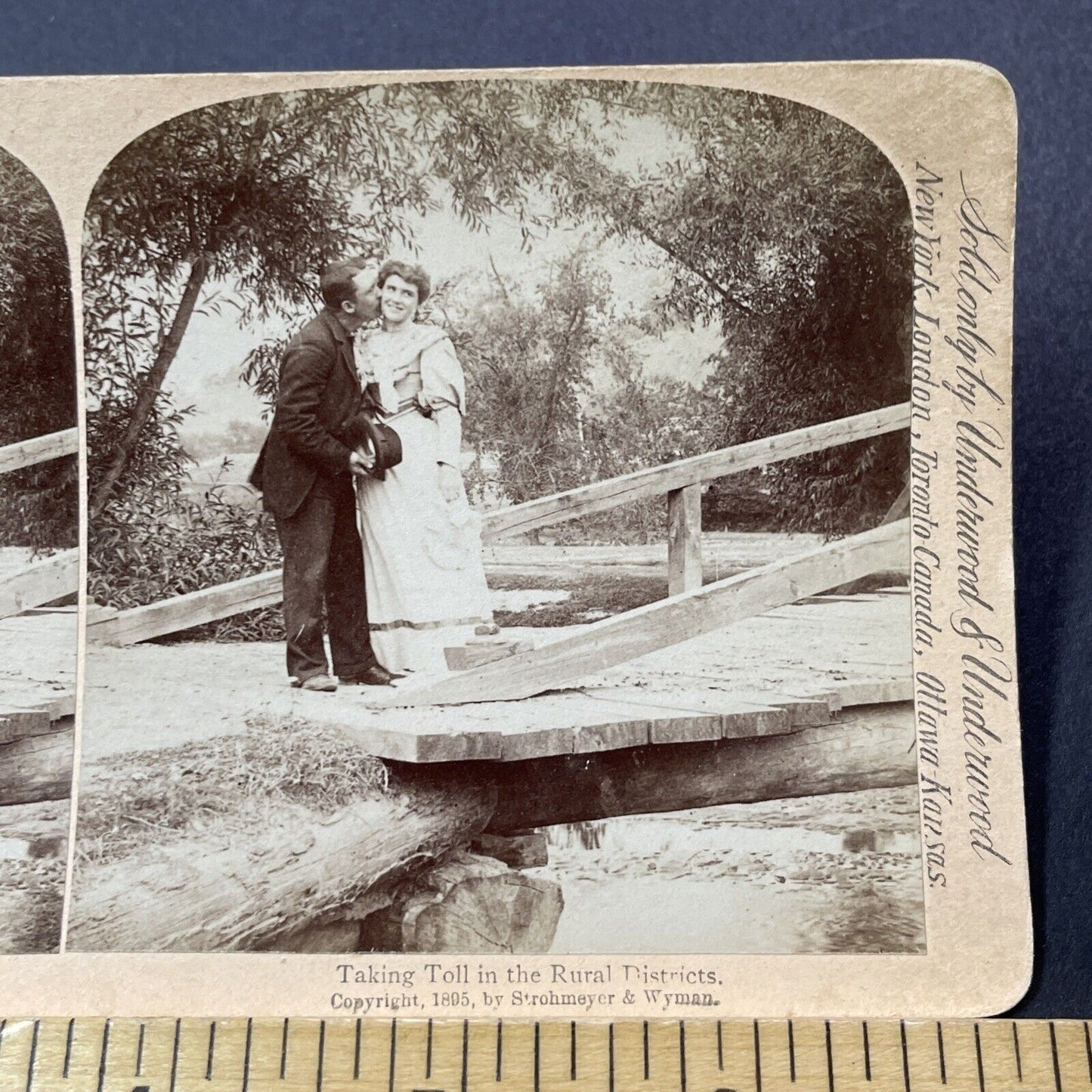 Antique 1895 Man Kisses Woman On Bridge Stereoview Photo Card V3264