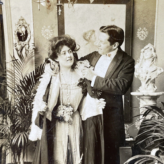 Antique 1902 Man Helps Woman With Coat Stereoview Photo Card P2917